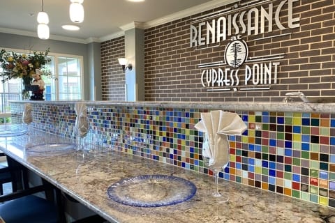 Dining area with colorful mosaic tiles