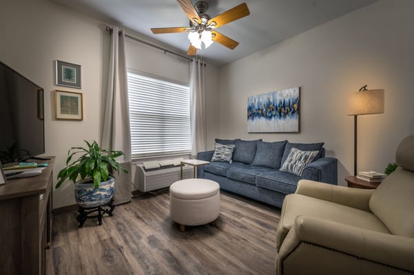 Bright interior living space with seating and decor