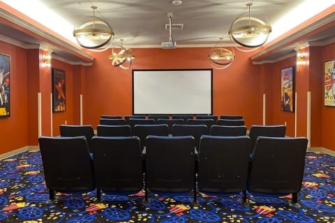 Interior view of a movie theater room with seating