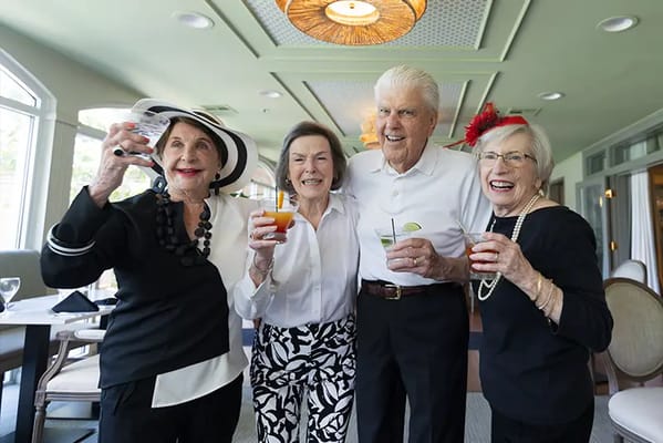 Residents enjoying drinks at a social gathering