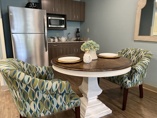Interior photo of a cozy dining area in a resident's room