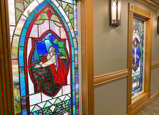 Stained glass windows in an interior hallway