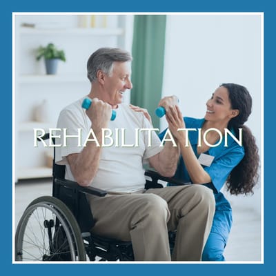 A staff member assisting a resident with weights in a rehabilitation session