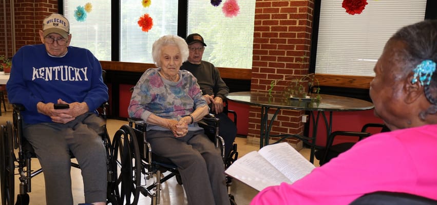Residents engaged in conversation in a common area