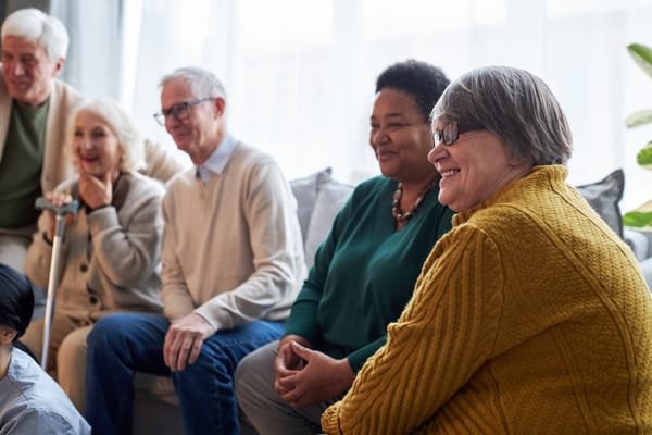 Residents engaged in an activity in a communal area