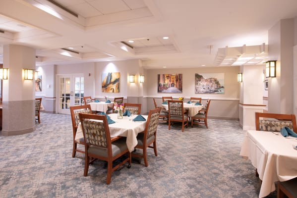 Dining area with tables set for a meal