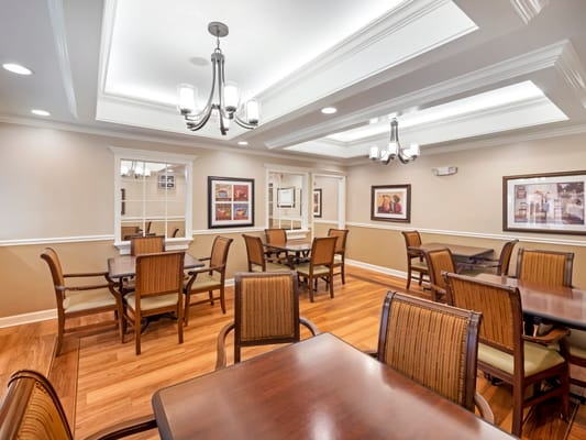 Bright dining room with wood tables and chairs