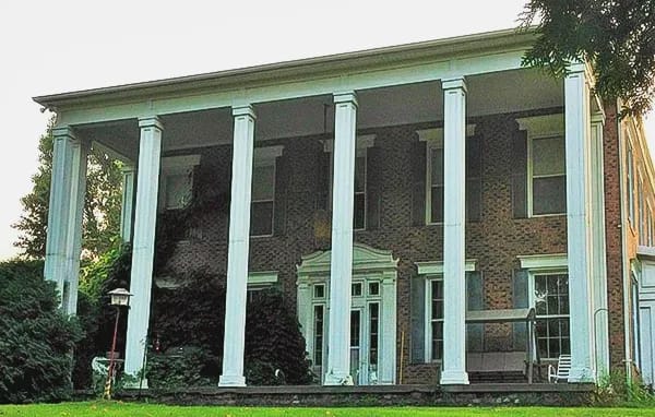 Exterior view of a historic building with columns