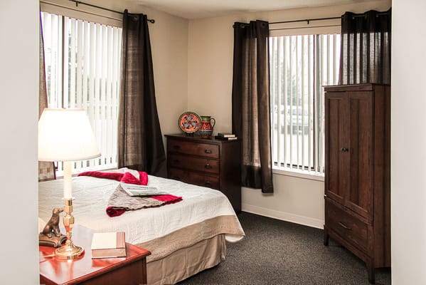 Cozy resident room with a neatly made bed