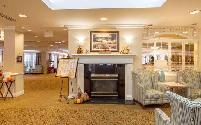 Interior view of a cozy common area with seating