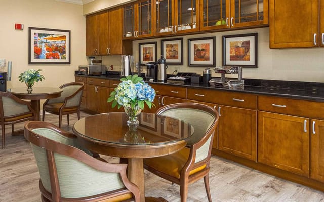 Cozy dining area with wooden furniture and decor