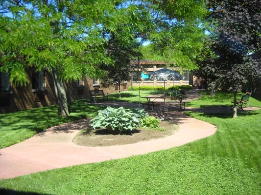 Tranquil outdoor courtyard with pathways and seating