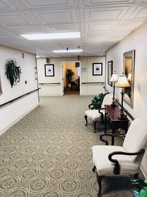 Well-decorated interior hallway of a senior facility
