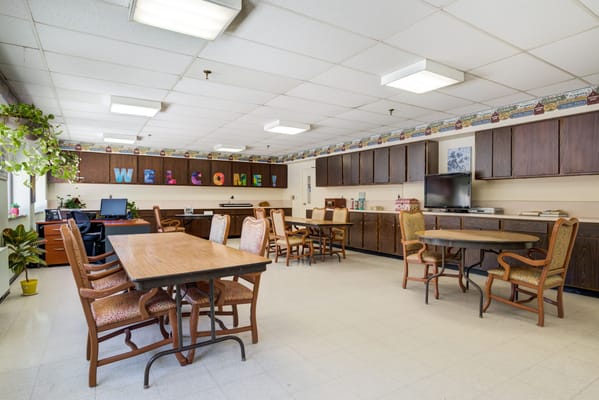 Spacious common area with welcome signage