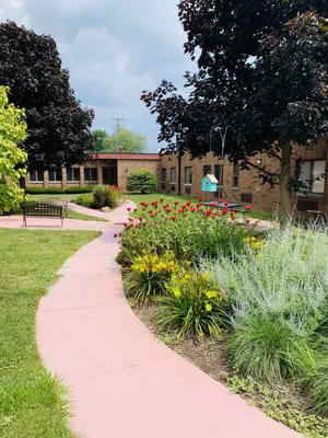 Pathway through landscaped garden at the facility
