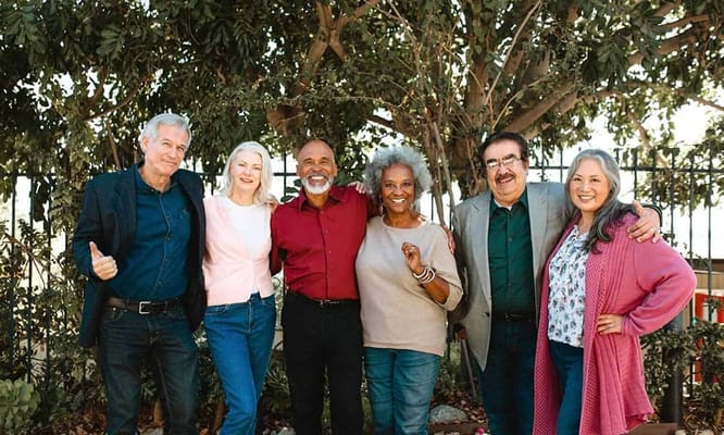 Group of diverse people smiling outdoors