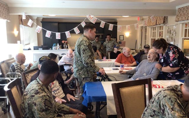 Residents engaging with visitors during a celebration