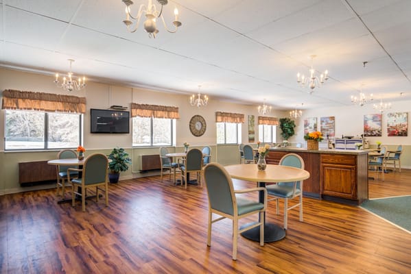 Bright and inviting dining room with tables and chairs