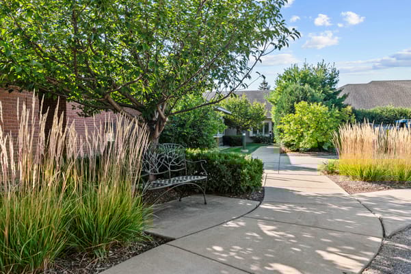 Pathway through a landscaped garden at the facility