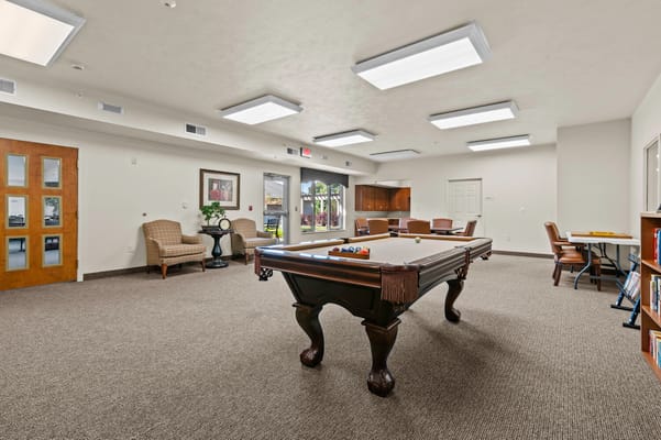 Interior view of a common area with pool table