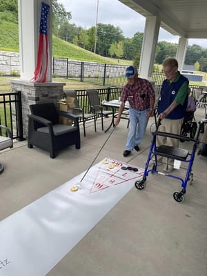Residents enjoying outdoor curling activity