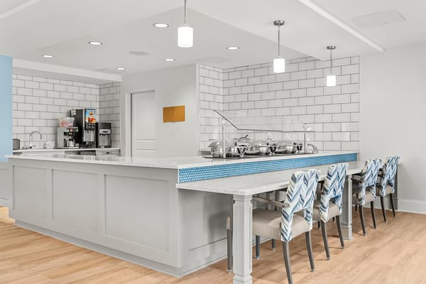 Bright, modern dining area with seating