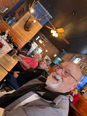 Residents enjoying a meal in a dining area