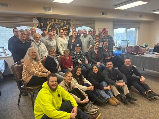 Residents and staff celebrating in a common area