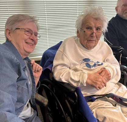 Residents smiling together in a common area