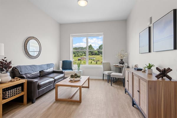 Bright interior common area with views of the outdoor space