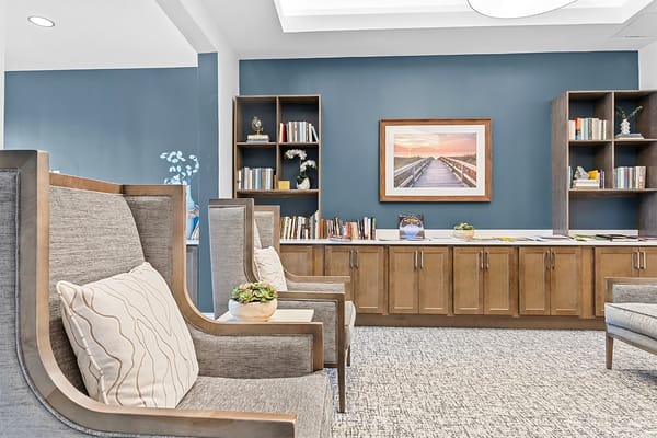 Cozy reading area with comfortable seating and bookshelves