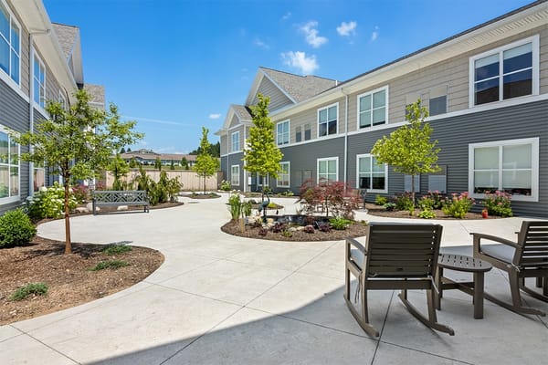Outdoor courtyard with seating and greenery
