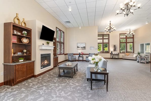 Interior common area with seating and fireplace