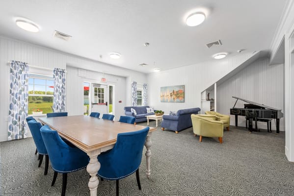 Interior view of a bright common area with furniture