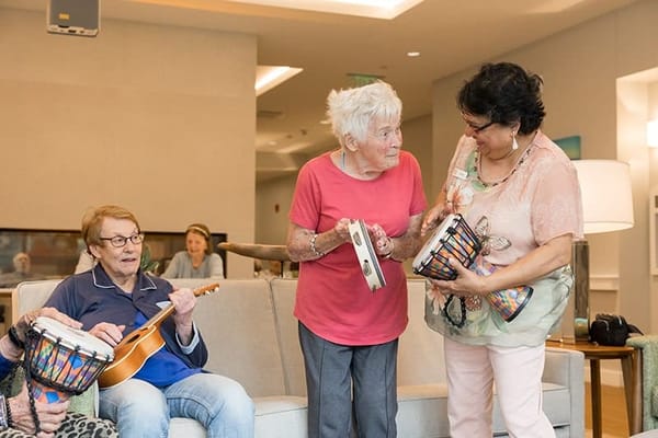 Residents participating in a music activity session