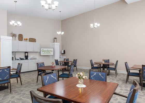 Bright common area with tables and chairs