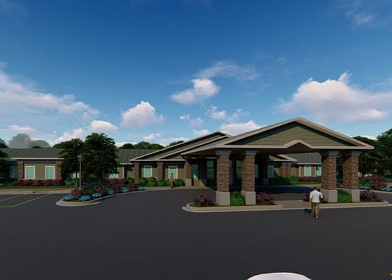 Exterior view of assisted living facility with landscaping