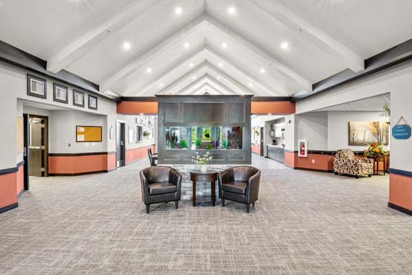 Interior view of a bright common area with seating
