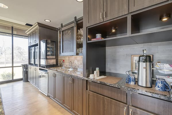 Interior kitchen area with modern cabinetry and appliances