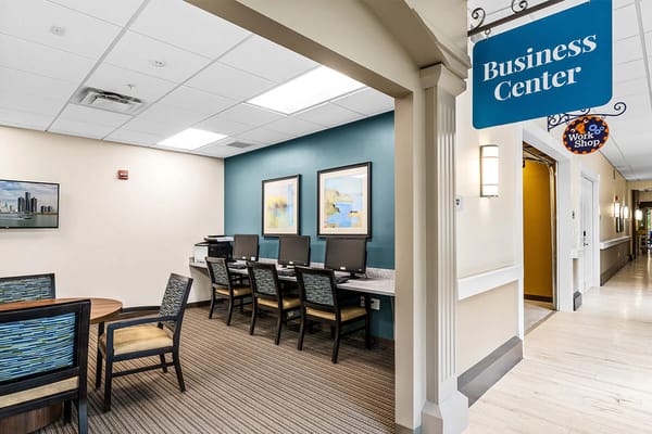 Interior view of a business center with computers