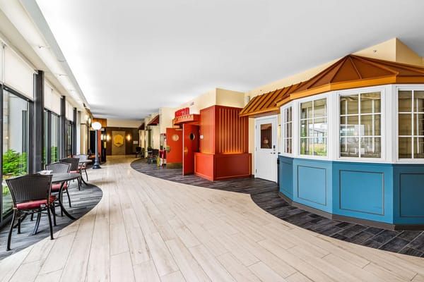 Bright interior common area with seating and decor