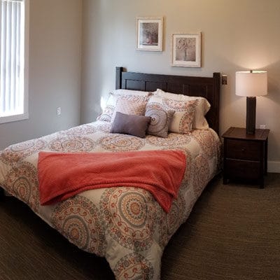 Cozy resident room with a bed and decor