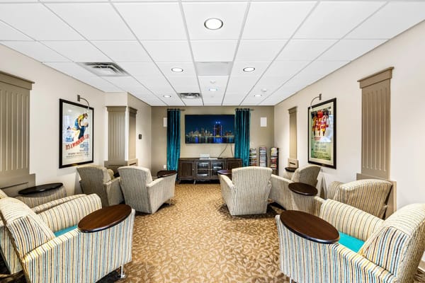 Cozy common area with seating and a television