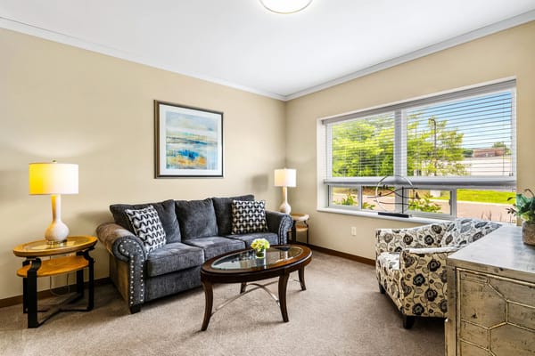 Cozy common area with seating and natural light