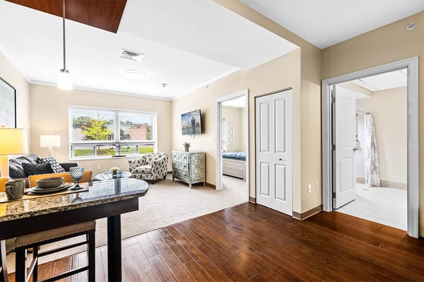 Interior view of a bright resident room and living area