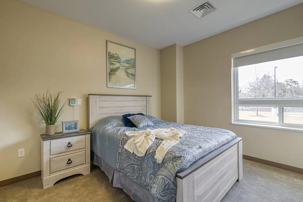 Cozy private room with a bed and window