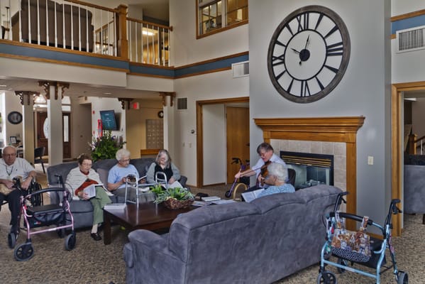 Residents socializing in a comfortable common area