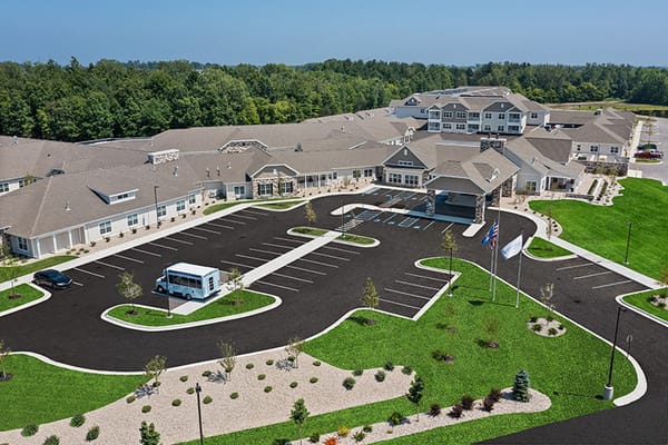 Aerial view of Quincy Place Senior Living with parking lot