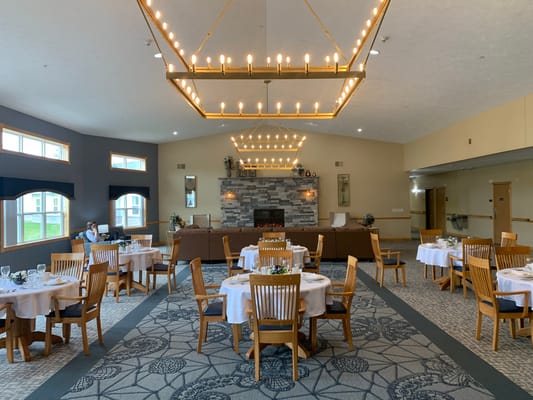 Dining room set for a meal with residents