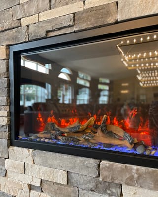 Fireplace in a cozy common area of a senior living facility